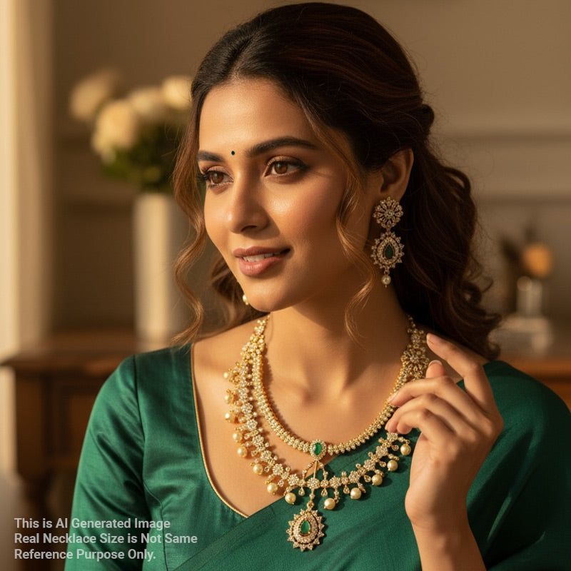 Woman wearing a green saree with gold jewelry in a warm indoor setting