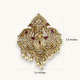 Embellished with shimmering faux diamonds, rich ruby-red stones, and delicate, dangling pearl droplets, this single jadai billa perfectly crowns the braid. It is the ultimate statement accessory for brides, festive occasions, and classical dancers looking for a blend of heritage artistry and contemporary elegance.