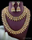 Gold necklace and earrings set on a purple stand with 'Jewel Palace' branding.
