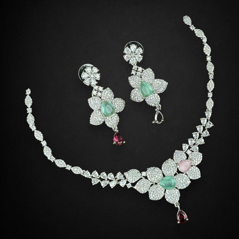 Jewelry set with necklace and earrings on a black background