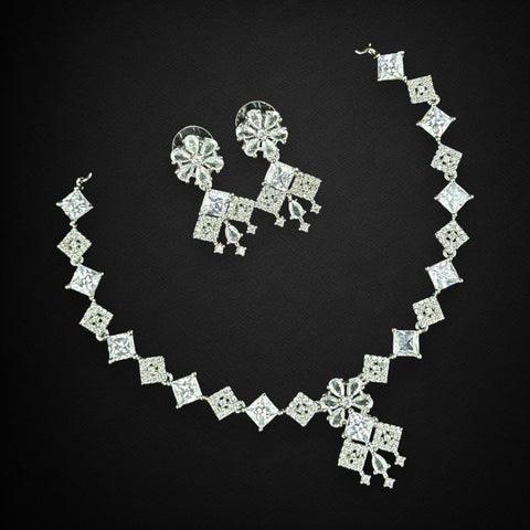 Jewelry set with necklace and earrings on a black background