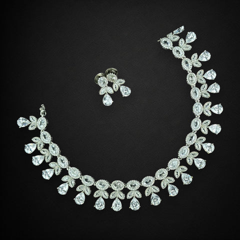 Diamante necklace and earrings on a black background