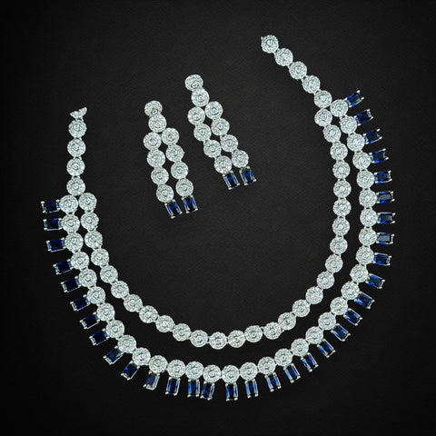 Jewelry set with necklace and earrings on a black background