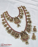 Ornate necklace set with red and green accents on a white background, branded 'Jewel Palace'.