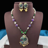 Jewelry set with necklace and earrings on a mannequin bust