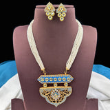 Jewelry set with necklace and earrings on a mannequin bust