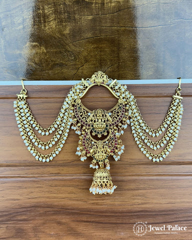 Ornate gold and pearl earrings on a wooden surface with 'Jewel Palace' branding.