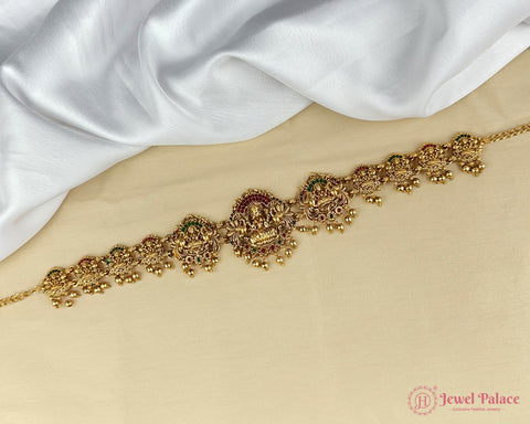 Gold bracelet on a white fabric background with 'Jewel Palace' branding.