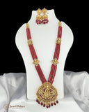 Red beaded necklace with gold accents and matching earrings on a white stand, branded 'Jewel Palace'.