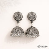 Pair of silver earrings with intricate designs on a white background, branded 'Jewel Palace'.