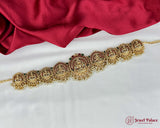 Decorative gold belt with gemstones on a white and red fabric background, featuring 'Jewel Palace' branding.