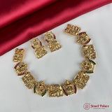 Gold necklace and earrings on a red and white fabric background with 'Jewel Palace' branding.