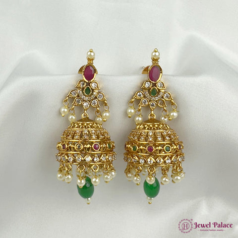Gold earrings with green and red stones on a white background, branded 'Jewel Palace'.