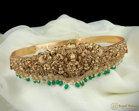 Gold and green decorative headband on a white surface with 'Jewel Palace' branding.