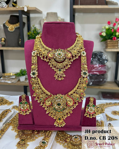 Gold necklace set on a mannequin bust with 'Jewel Palace' branding.
