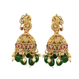 Gold earrings with green and red stones on a white background