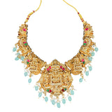 Gold necklace with gemstones on a white background
