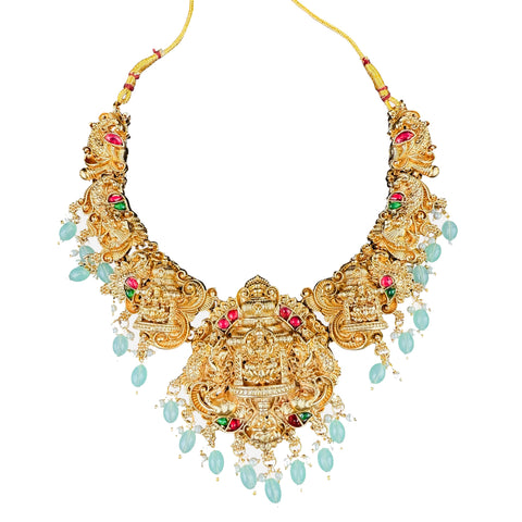 Gold necklace with gemstones on a white background