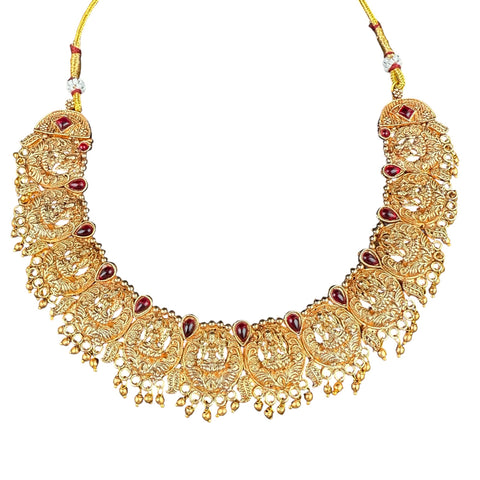 Gold necklace with red stones on a white background