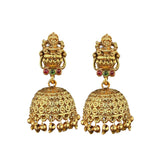 Gold earrings with intricate designs on a white background