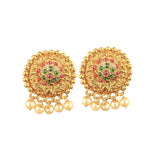 Pair of gold earrings with colorful gemstones on a white background