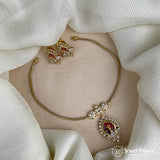 Gold necklace and earrings set on a mannequin bust with a white fabric background, featuring 'Jewel Palace' branding.