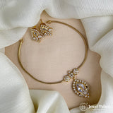 Gold necklace and earrings on a white fabric background with 'Jewel Palace' branding.