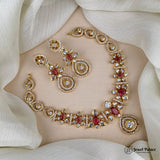 Ornate necklace and earrings set on a neutral background with 'Jewel Palace' branding.