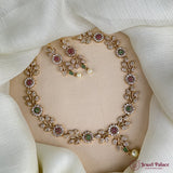 Delicate necklace with floral design on a mannequin bust, brand 'Jewel Palace' visible.