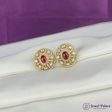 Gold earrings with red stones on a white surface, branded 'Jewel Palace'.