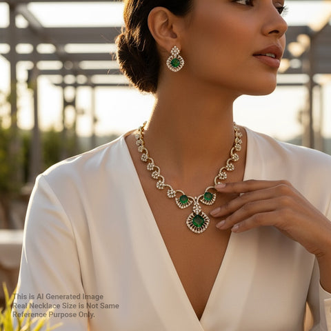 Woman wearing a green and gold necklace with a blurred outdoor background
