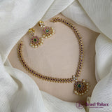 Jewelry set with necklace and earrings on a white fabric background, featuring 'Jewel Palace' branding.