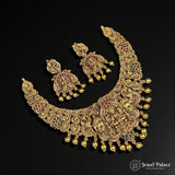 Ornate gold necklace and earrings on a black background with 'Jewel Palace' branding.