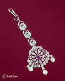 Decorative keychain with intricate design on a red background, featuring the brand 'Jewel Palace'.