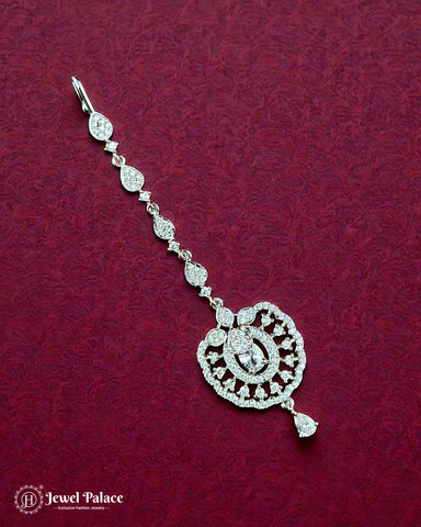 Silver decorative item on a red textured background with 'Jewel Palace' branding.