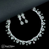 Diamond necklace and earrings set on a black background with 'Jewel Palace' branding.