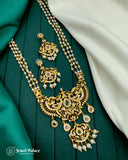 Gold and pearl jewelry set on a green fabric background with 'Jewel Palace' branding.