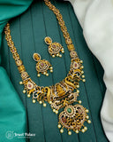 Gold necklace and earrings set on a green fabric background with 'Jewel Palace' branding.