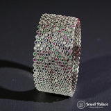 Silver bracelet with gemstones on a dark background, branded 'Jewel Palace'.