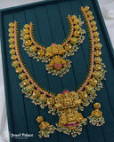 Ornate gold necklace with green and red stones on a teal background, brand 'Jewel Palace' visible.