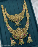 Ornate gold necklace with green and red stones on a teal background, brand 'Jewel Palace' visible.