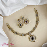 Gold necklace and earrings set on a mannequin with 'Jewel Palace' branding.