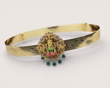 Gold belt with intricate design and colorful gemstones on a white background