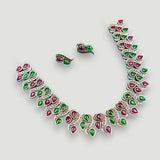Jewelry set with necklace and earrings on a white background