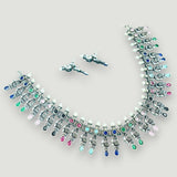 Jewelry set with necklace and earrings on a light gray background