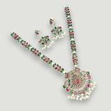 Jewelry set with necklace, earrings, and bangles on a light gray background