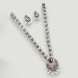Jewelry set with necklace and earrings on a light gray background