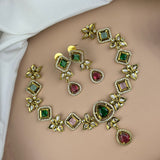 Ornate necklace with gemstones on a plain background