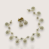 Jewelry set with necklace and earrings on a light background