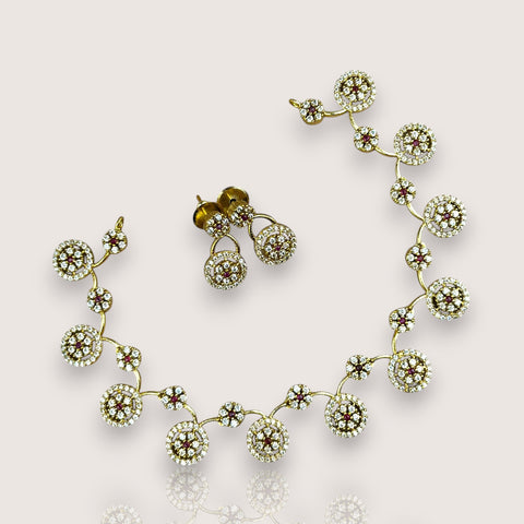 Jewelry set with necklace and earrings on a light background